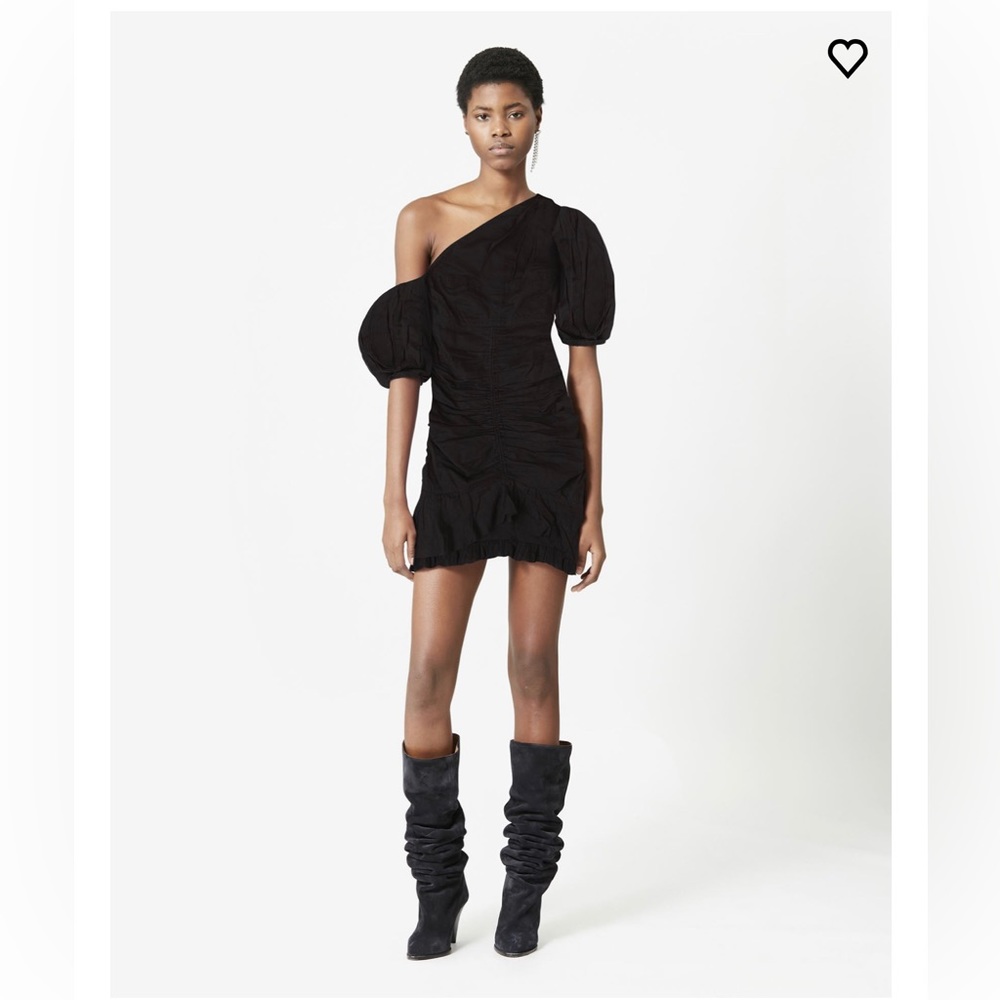 Cotton mini dress
Assymetric puff sleeves